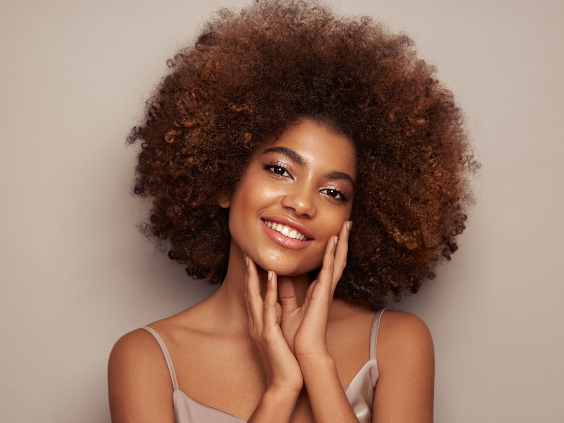 African American woman pleased with her FaceTite results at Cultura in Washington DC